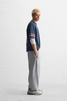 T-SHIRT STRUCTURE OUVERTE VARSITY