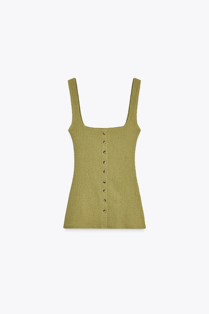TOP TEXTURÉ À BOUTONS