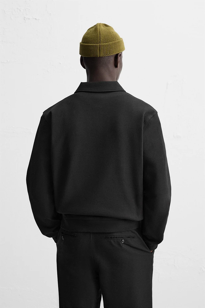 INTERLOCK POLO QUARTER-ZIP SWEATSHIRT