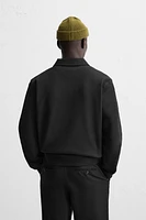 INTERLOCK POLO QUARTER-ZIP SWEATSHIRT