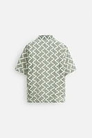CHEMISE STRUCTURÉE AJOURÉE