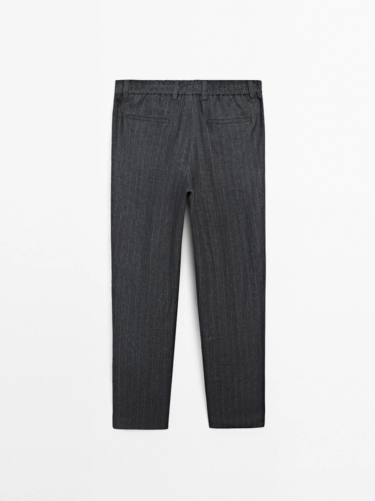 Faded 100% linen striped trousers