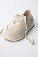 BASKETS EN CUIR