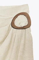 BUCKLE MIDI SKIRT