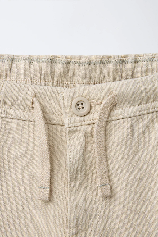 TEXTURED STRETCH PANTS