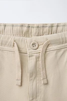 TEXTURED STRETCH PANTS