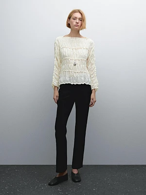 Pantalon flare stretch en cuir et daim