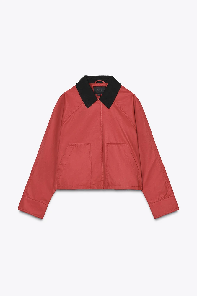 VESTE CIRÉE À COL EN MATIÈRES VARIÉES