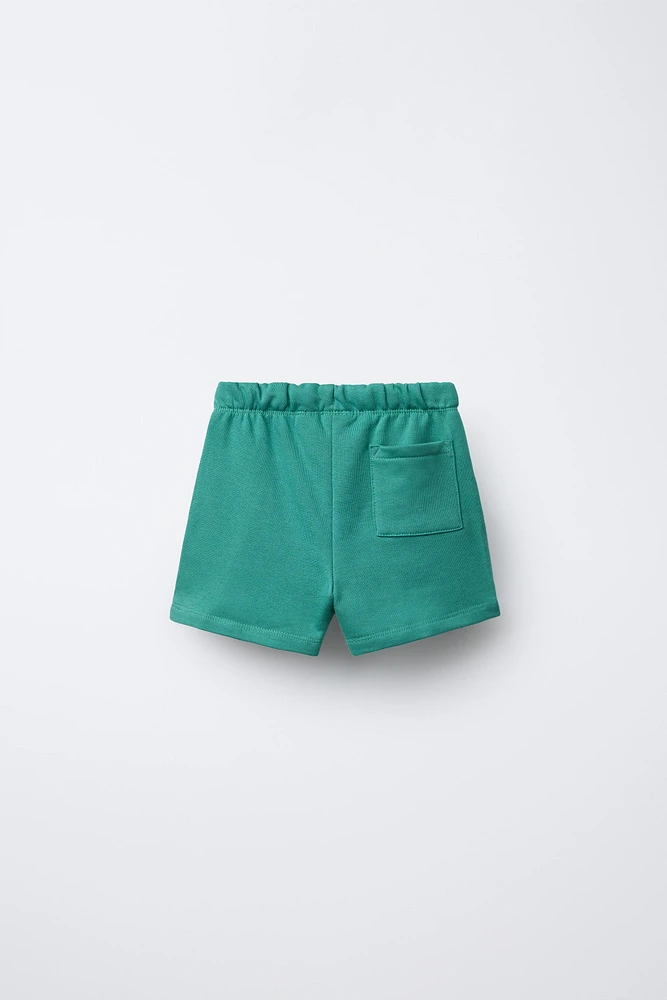 TEXT PLUSH SHORTS