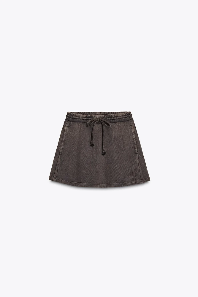 MINI-JUPE EN COTON ÉPAIS EFFET DÉLAVÉ