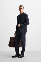 TEXTURED SUIT BLAZER