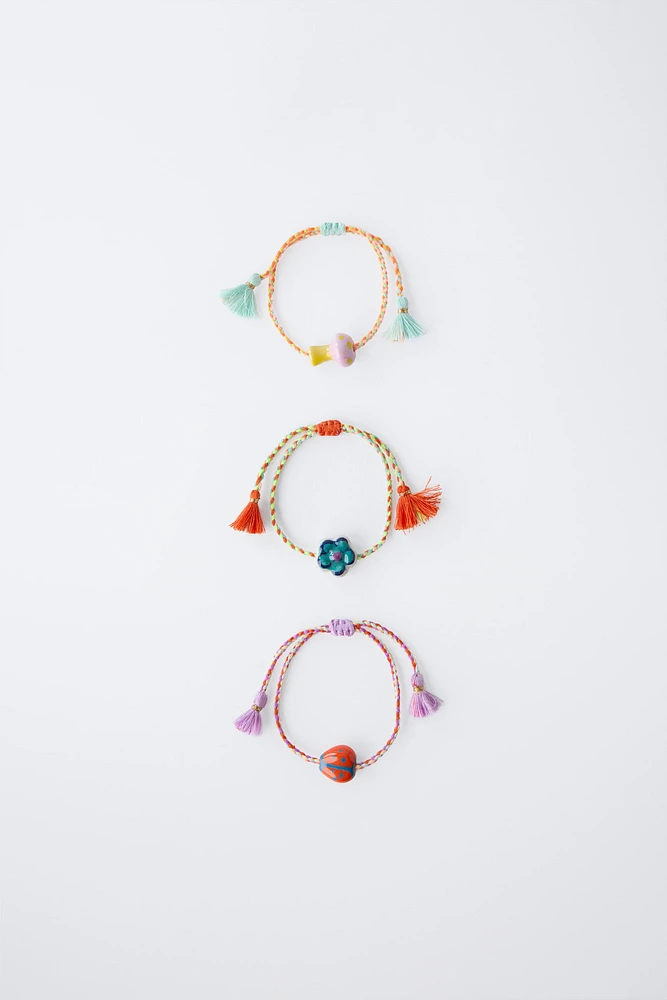 PACK OF THREE CORD BRACELETS WITH CERAMIC