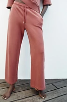 WASHED EFFECT WIDE LEG PANTS