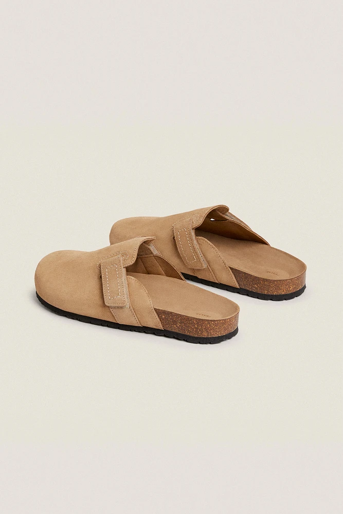LEATHER CLOGS WITH BACKSTITCHING
