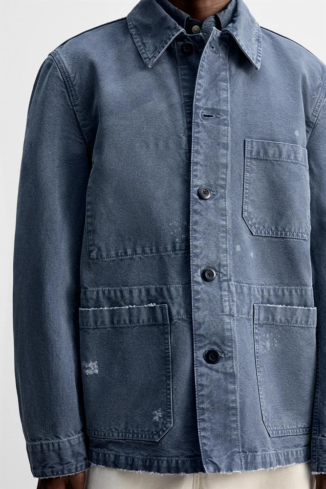 VESTE LAVAGE ÉCLABOUSSURES