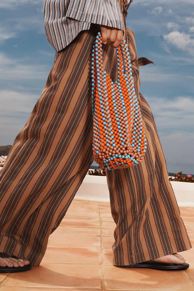 LIMITED EDITION STRIPED BELTED PANTS