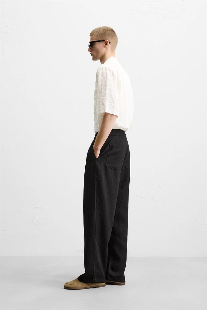 FLOWY PLEATED PANTS
