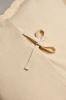 HOUSSE DE COUSSIN ENFANT BORD AJOURÉ