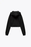 CROPPED INTERLOCK SWEATSHIRT