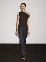 Top asymétrique avec nœud