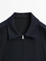 Jacket with adjustable hem detail