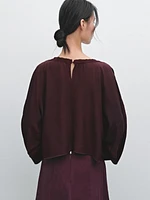 Flowing blouse with gathered detail