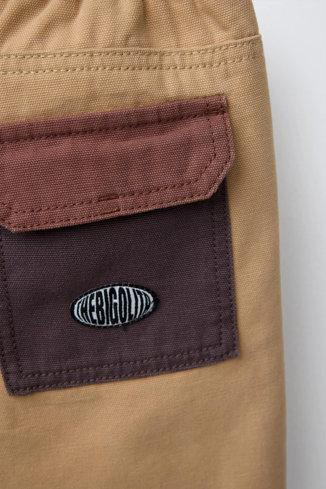 CONTRASTING POCKET TWILL SHORTS
