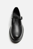 CHAUSSURES À VOLUME ET BOUCLE