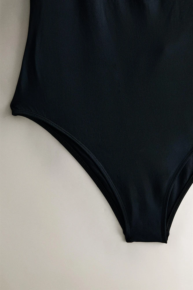 PLAIN BEACH SWIMSUIT WITH STRAPS AT THE BACK