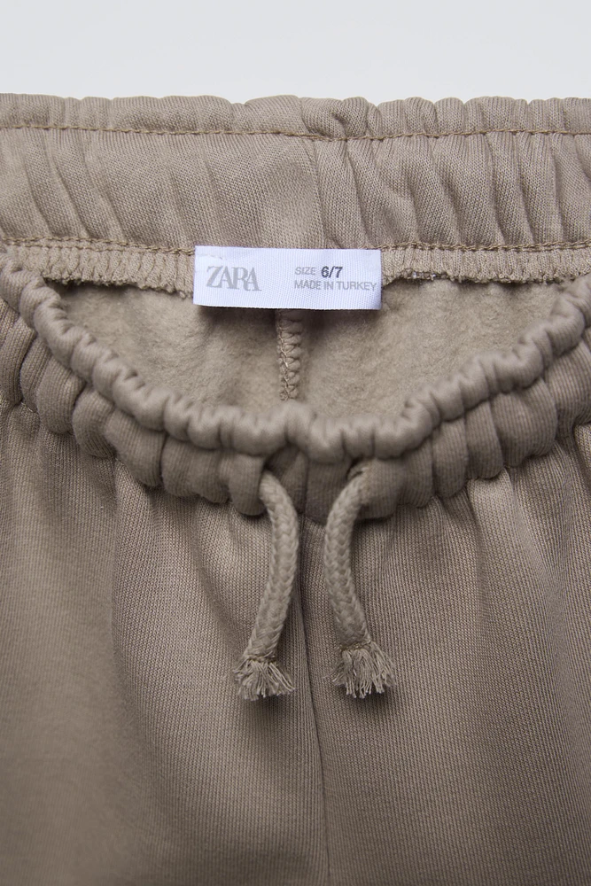 PLUSH WIDE LEG TEXT PANTS