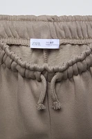 PLUSH WIDE LEG TEXT PANTS