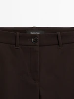 Pantalon slim flare taille basse