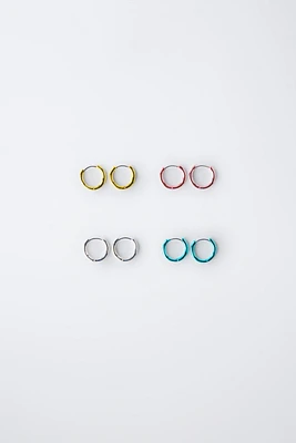 LOT DE QUATRE BOUCLES D'OREILLES CRÉOLES