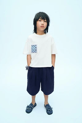 X FANGLU LIN PATCH T-SHIRT