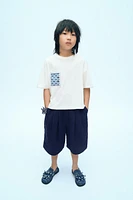 X FANGLU LIN PATCH T-SHIRT