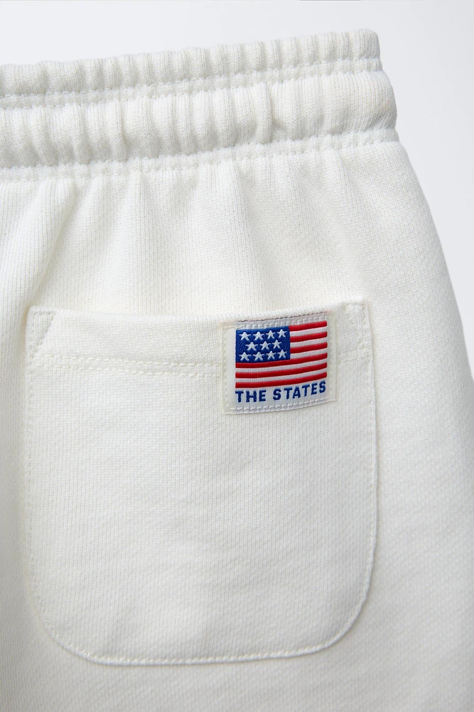 EMBROIDERED TEXT SHORTS