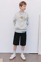 PRINTED TIE-DYE SWEATSHIRT