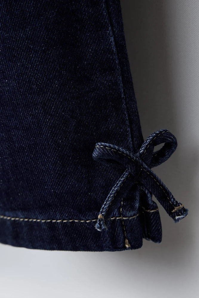 JUPE-CULOTTE EN JEAN À NŒUDS
