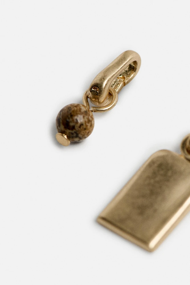 TWO-PACK OF CONTRASTING CHARMS