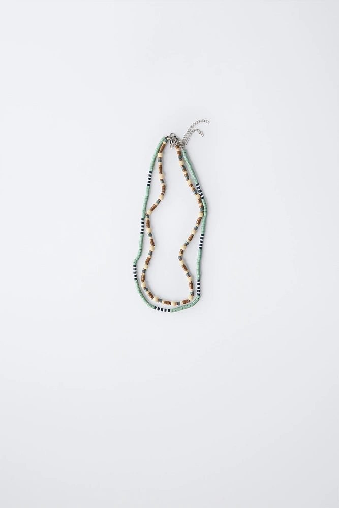 TWO PACK OF WOOD NECKLACES
