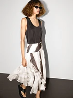 Long sleeveless satin blouse