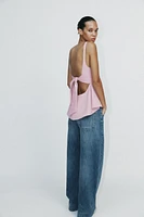 PEPLUM BOW TOP