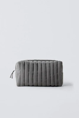 TEXTURED POUCH