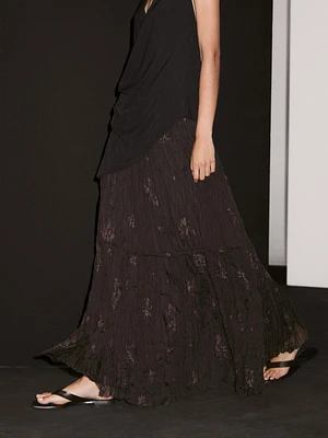 Long pleated skirt with embroidered detail