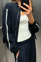 VESTE À BANDE LATÉRALE
