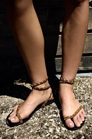 SANDALES À BRIDES ET CLOUS EN CUIR