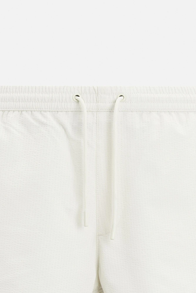MAILLOT DE BAIN MI-LONG EN SEERSUCKER