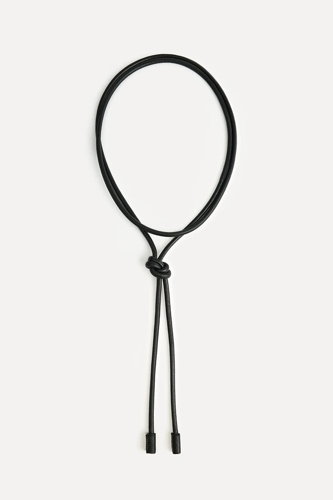 CIRCULAR LEATHER BELT 50TH ANNIVERSARY