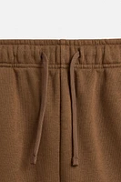 BERMUDA DE JOGGING COUTURES