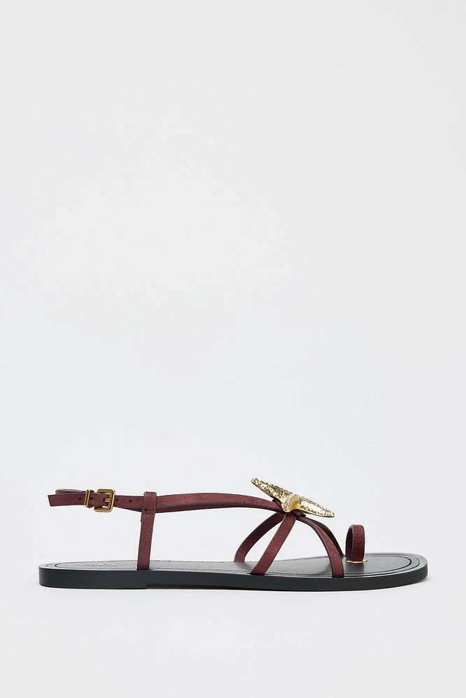 STRAPPY SANDALS WITH METALLIC DETAIL